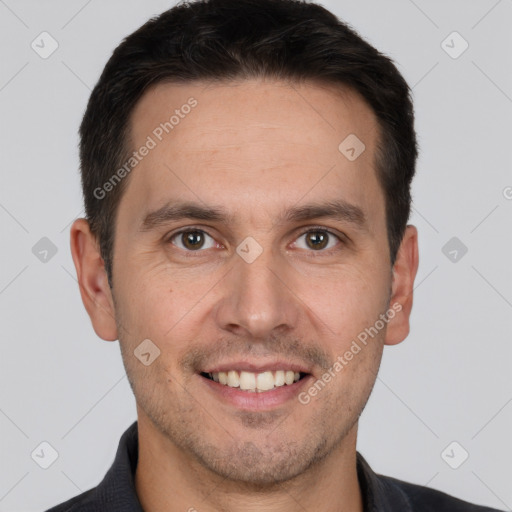 Joyful white young-adult male with short  brown hair and brown eyes