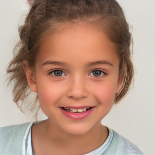 Joyful white child female with medium  brown hair and brown eyes