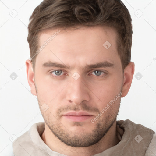 Neutral white young-adult male with short  brown hair and grey eyes