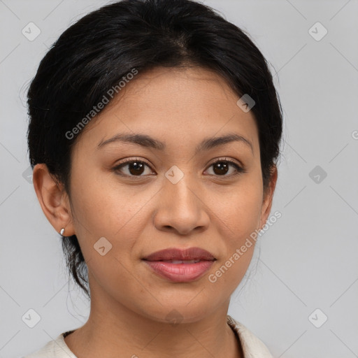 Joyful latino young-adult female with medium  brown hair and brown eyes