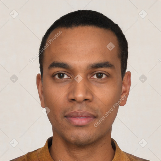 Neutral latino young-adult male with short  black hair and brown eyes