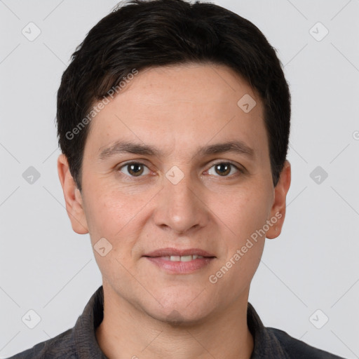 Joyful white young-adult male with short  brown hair and brown eyes