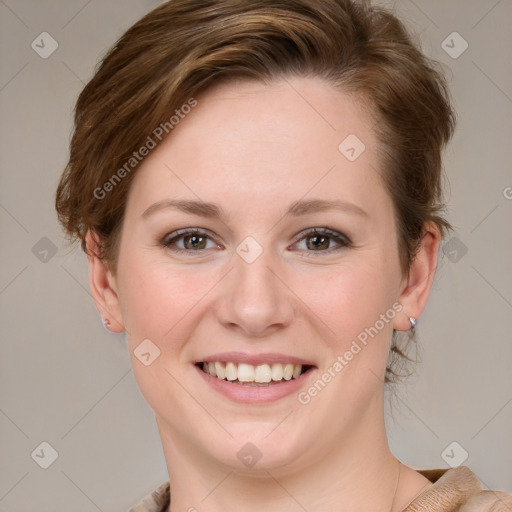 Joyful white young-adult female with medium  brown hair and blue eyes