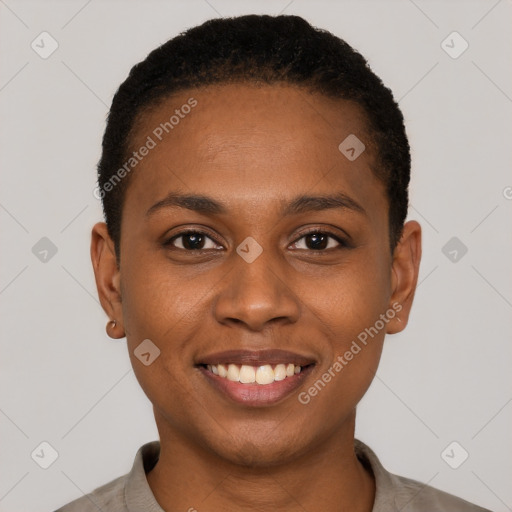 Joyful black young-adult female with short  black hair and brown eyes