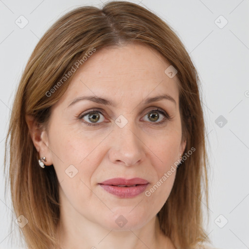 Joyful white adult female with medium  brown hair and grey eyes