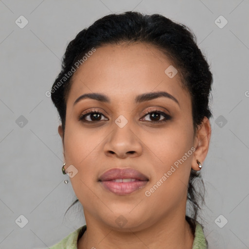 Joyful latino young-adult female with short  black hair and brown eyes