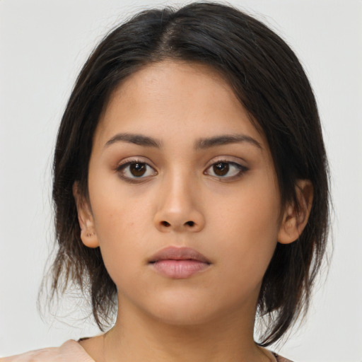 Neutral asian young-adult female with medium  brown hair and brown eyes