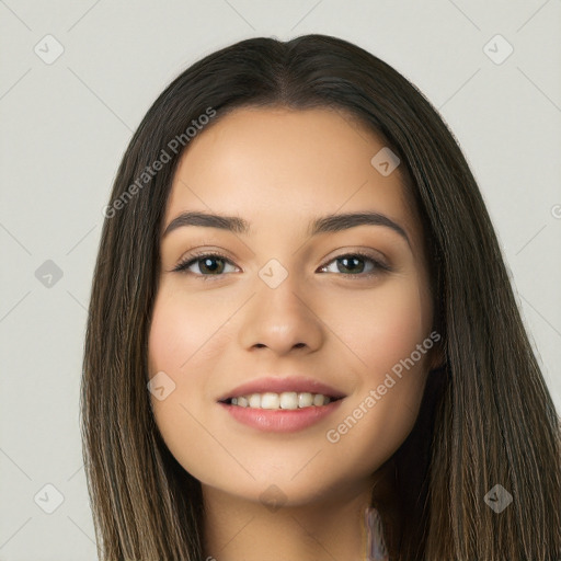 Joyful asian young-adult female with long  brown hair and brown eyes