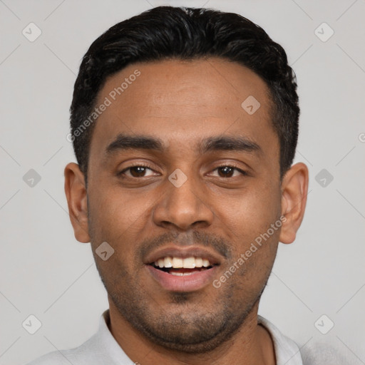 Joyful black young-adult male with short  black hair and brown eyes