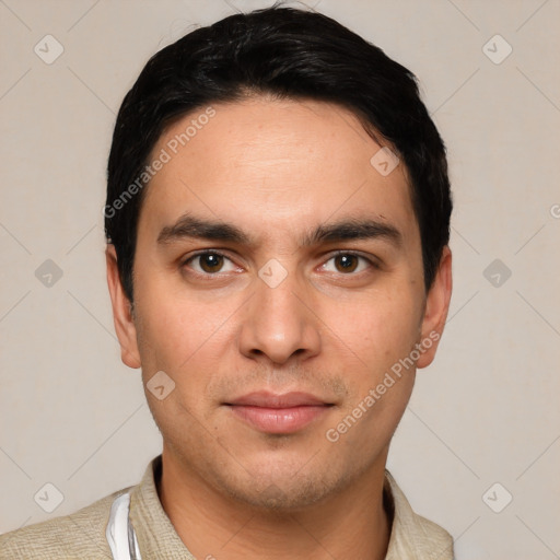 Joyful white young-adult male with short  black hair and brown eyes