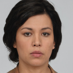 Neutral asian young-adult female with medium  brown hair and brown eyes