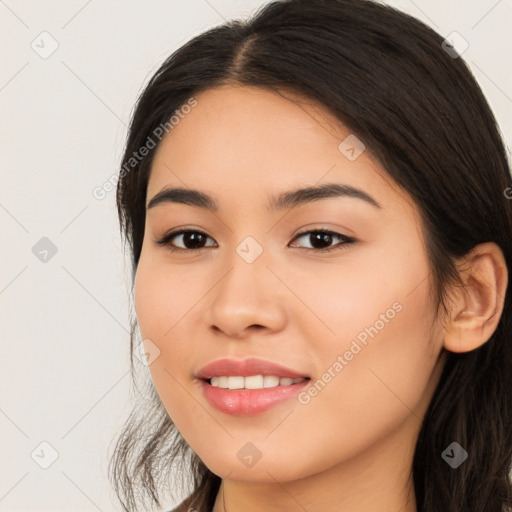 Joyful white young-adult female with long  brown hair and brown eyes