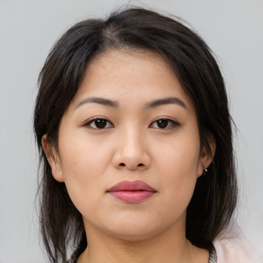 Neutral asian young-adult female with medium  brown hair and brown eyes