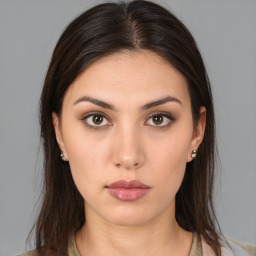 Neutral white young-adult female with medium  brown hair and brown eyes