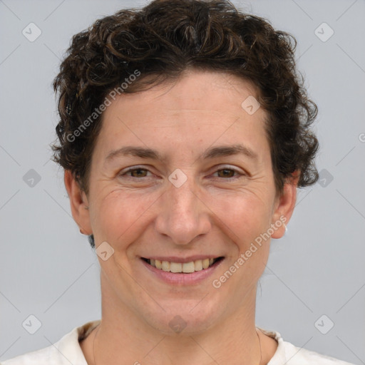 Joyful white adult female with short  brown hair and brown eyes