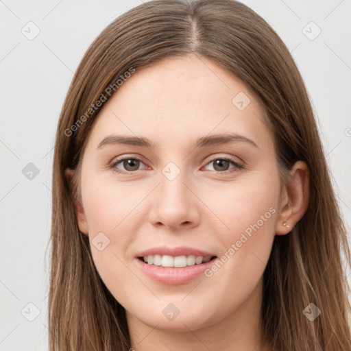 Joyful white young-adult female with long  brown hair and grey eyes