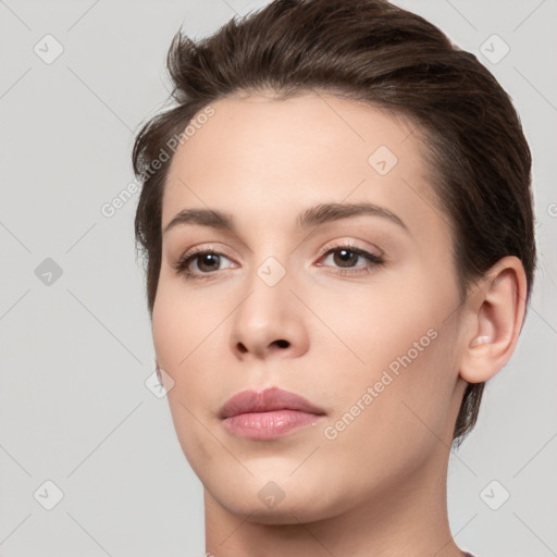 Neutral white young-adult female with medium  brown hair and brown eyes