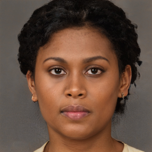 Neutral black young-adult female with short  brown hair and brown eyes