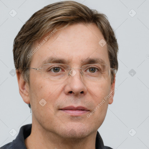 Joyful white adult male with short  brown hair and grey eyes