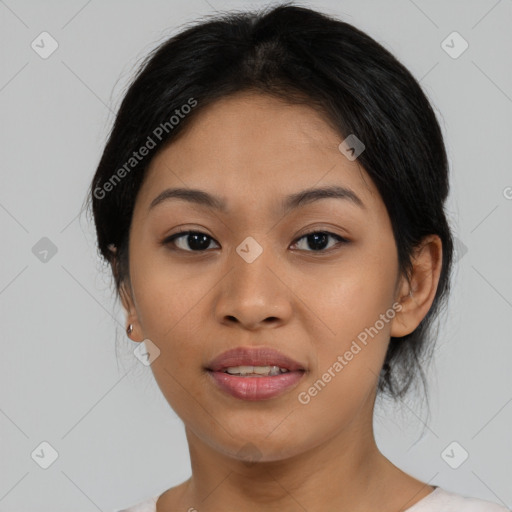 Joyful asian young-adult female with medium  black hair and brown eyes