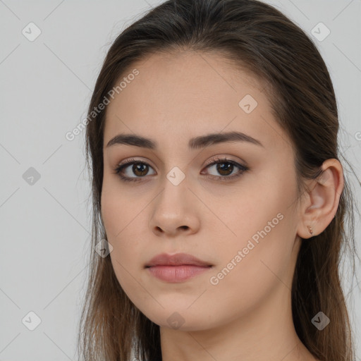 Neutral white young-adult female with long  brown hair and brown eyes