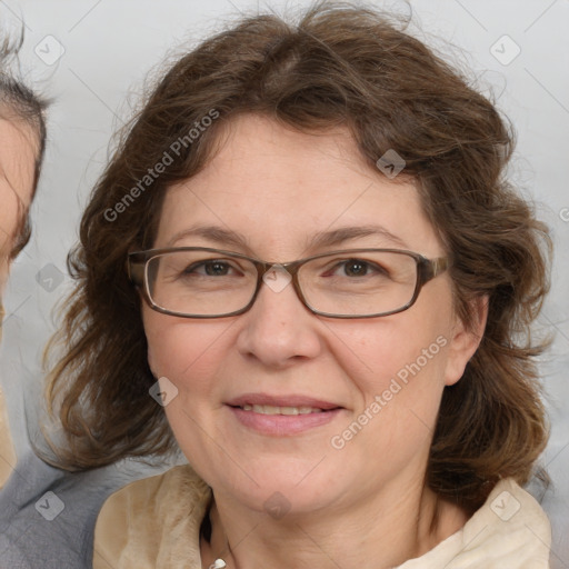 Joyful white middle-aged female with medium  brown hair and brown eyes