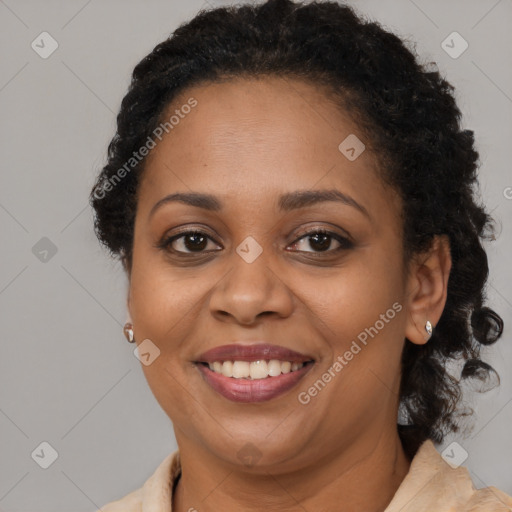 Joyful latino adult female with medium  brown hair and brown eyes