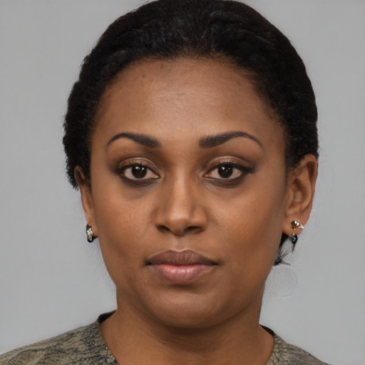 Neutral black young-adult female with short  black hair and brown eyes