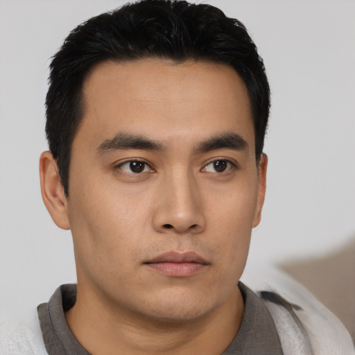 Neutral asian young-adult male with short  black hair and brown eyes