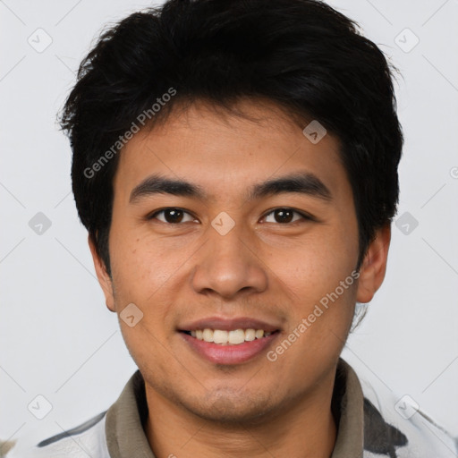 Joyful asian young-adult male with short  black hair and brown eyes