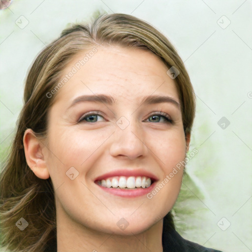 Joyful white young-adult female with long  brown hair and green eyes