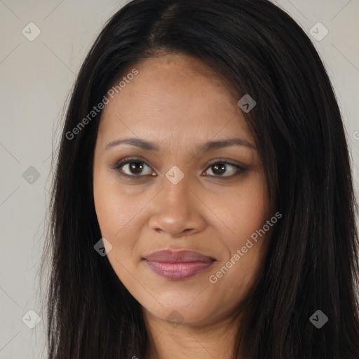 Joyful black young-adult female with long  brown hair and brown eyes