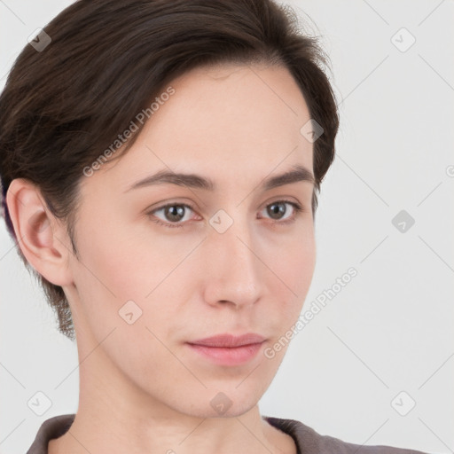 Neutral white young-adult female with short  brown hair and brown eyes