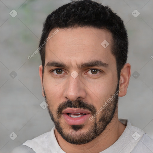 Joyful white young-adult male with short  black hair and brown eyes