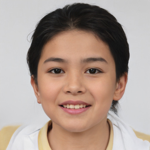 Joyful asian child female with medium  brown hair and brown eyes