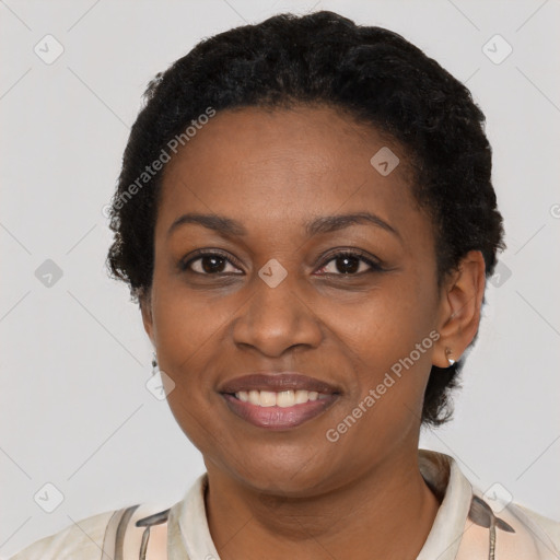 Joyful latino young-adult female with short  black hair and brown eyes