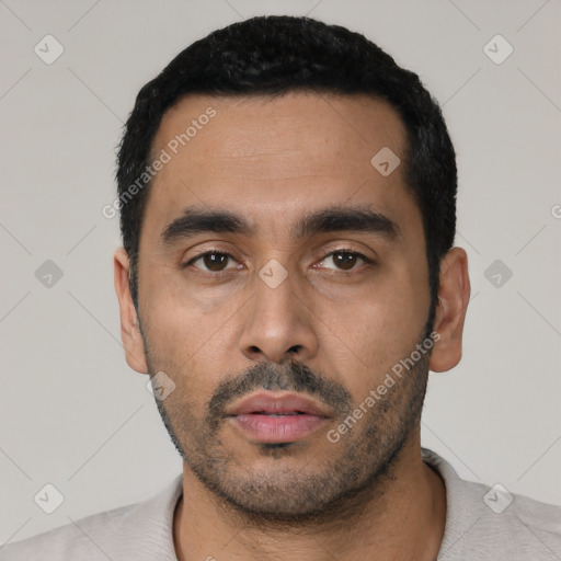 Neutral latino young-adult male with short  black hair and brown eyes