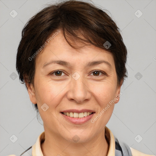 Joyful white adult female with short  brown hair and brown eyes