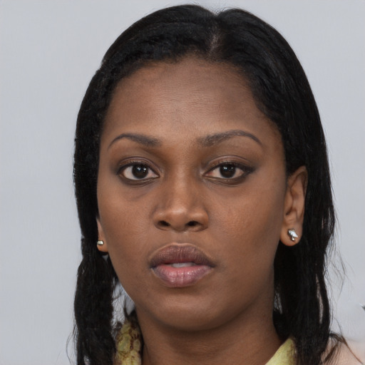 Neutral black young-adult female with long  black hair and brown eyes