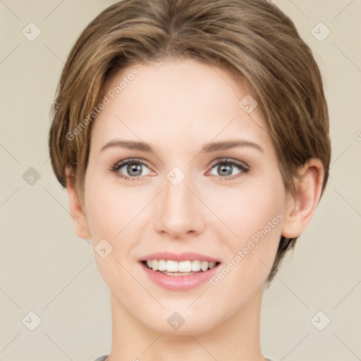 Joyful white young-adult female with medium  brown hair and green eyes