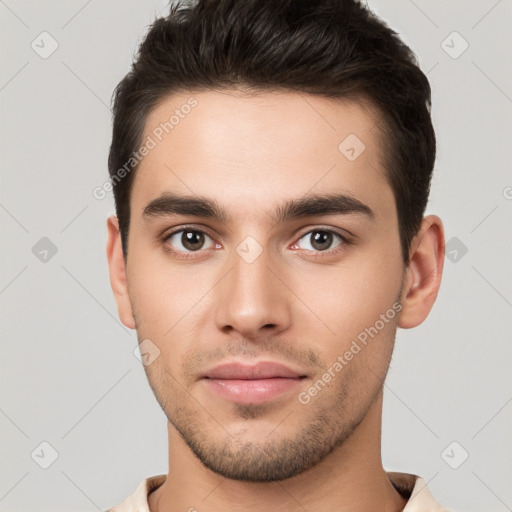 Neutral white young-adult male with short  brown hair and brown eyes