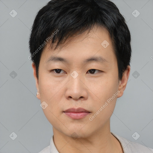 Neutral asian young-adult male with short  black hair and brown eyes