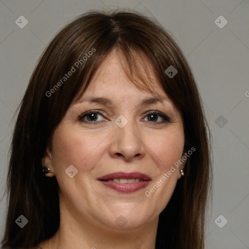 Joyful white adult female with medium  brown hair and brown eyes