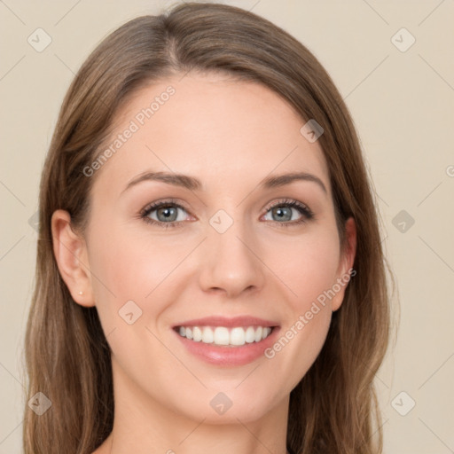 Joyful white young-adult female with long  brown hair and green eyes