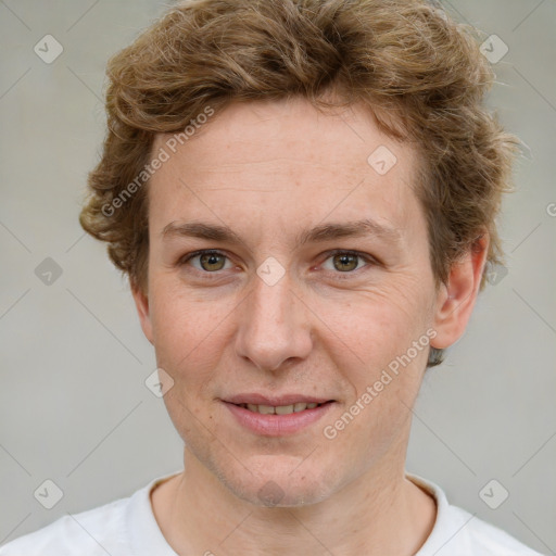 Joyful white adult female with short  brown hair and grey eyes