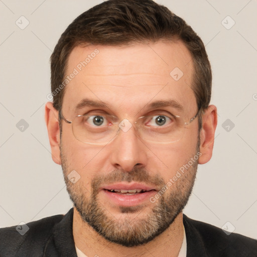 Joyful white adult male with short  brown hair and brown eyes