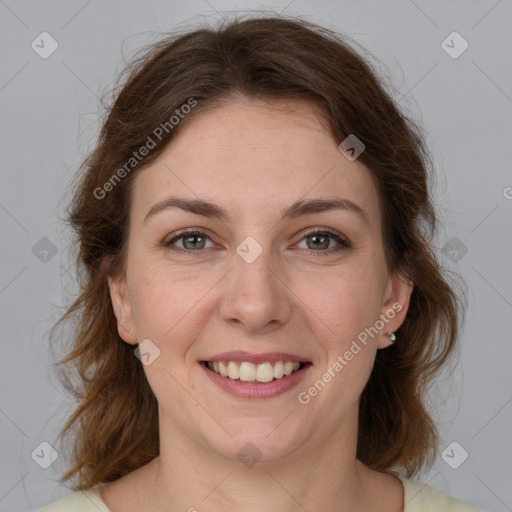 Joyful white young-adult female with medium  brown hair and green eyes