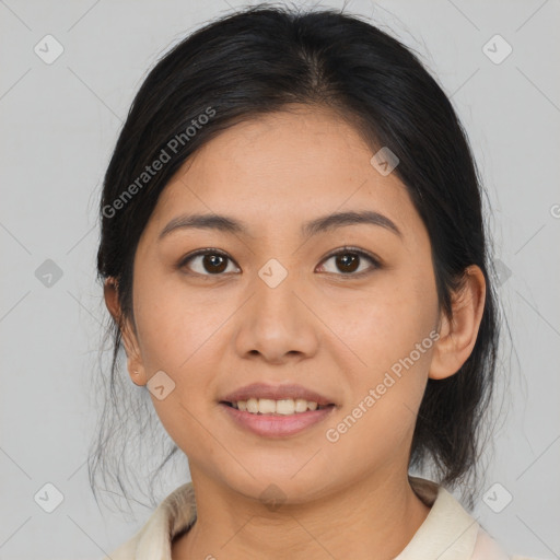 Joyful asian young-adult female with medium  brown hair and brown eyes