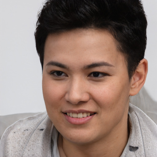 Joyful asian young-adult female with short  brown hair and brown eyes