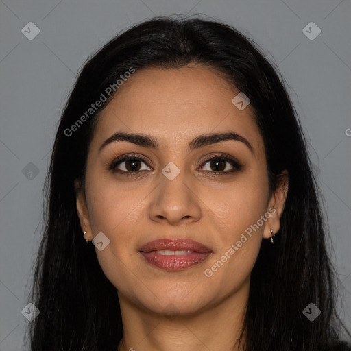 Joyful latino young-adult female with long  brown hair and brown eyes